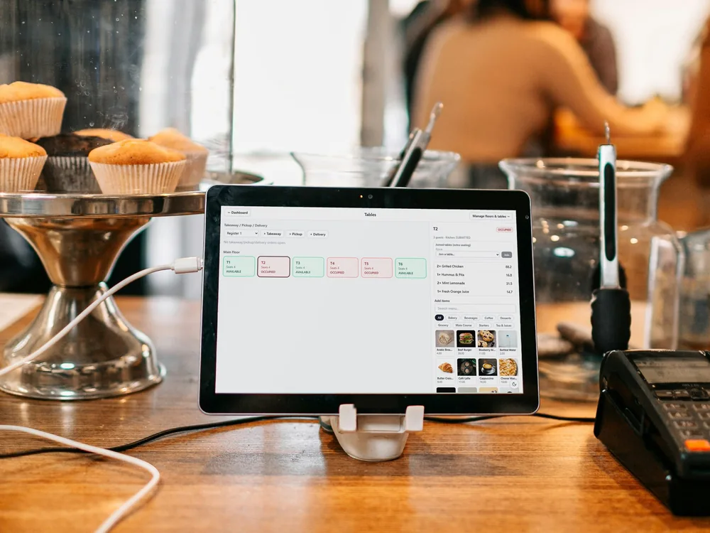 SELLO restaurant tables screen on a POS terminal